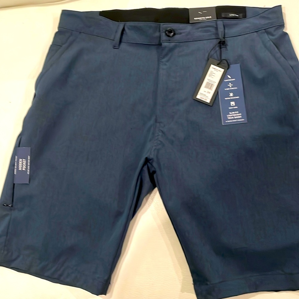 Brand new Kenneth Cole slim fit size 34 blue shorts with tags.